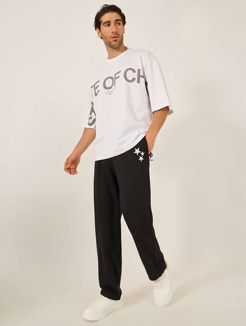 men black printed relaxed fit track pant - 21971710 - Standard Image - 2
