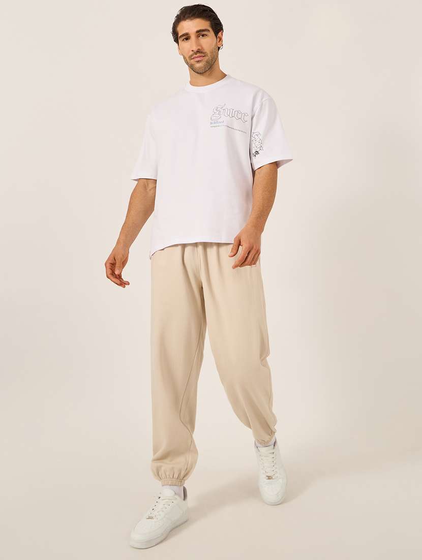 men solid mid rise relaxed fit jogger - 21971716 -  Standard Image - 2