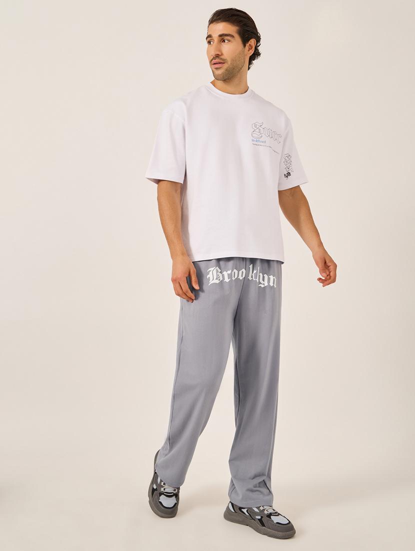 men printed mid rise relaxed fit track pant - 21971724 - Standard Image - 2