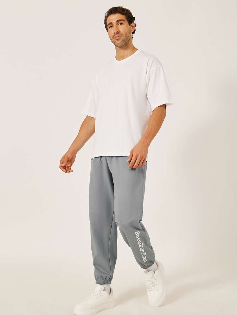 men solid mid rise relaxed fit jogger - 21971733 -  Standard Image - 2