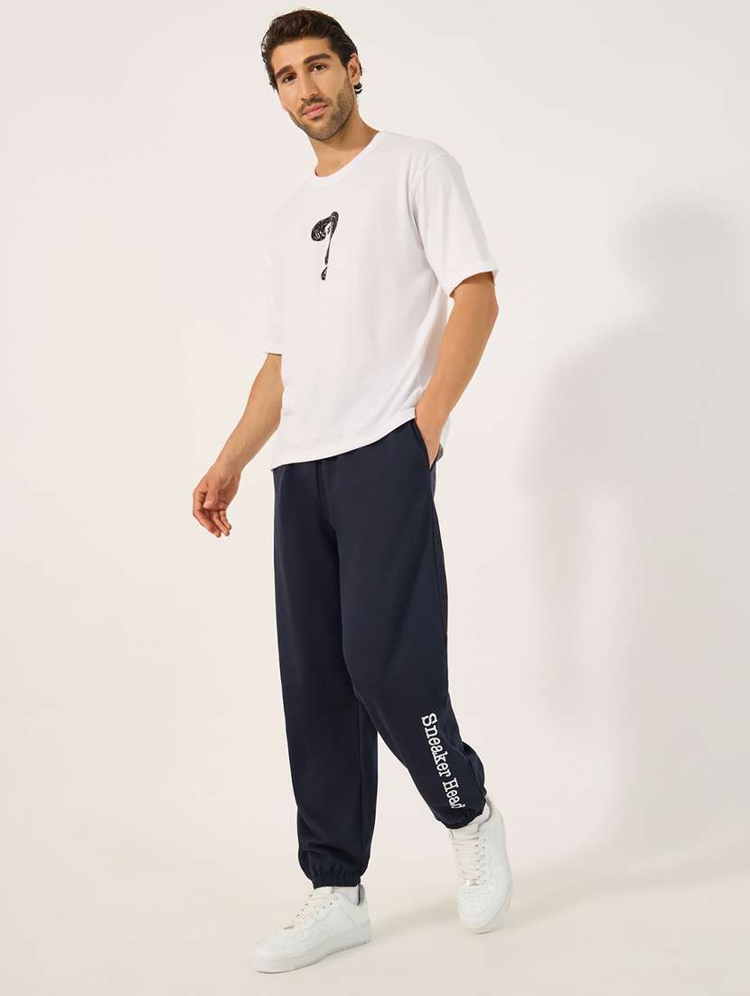 men printed mid rise relaxed fit jogger - 21971734 -  Standard Image - 2