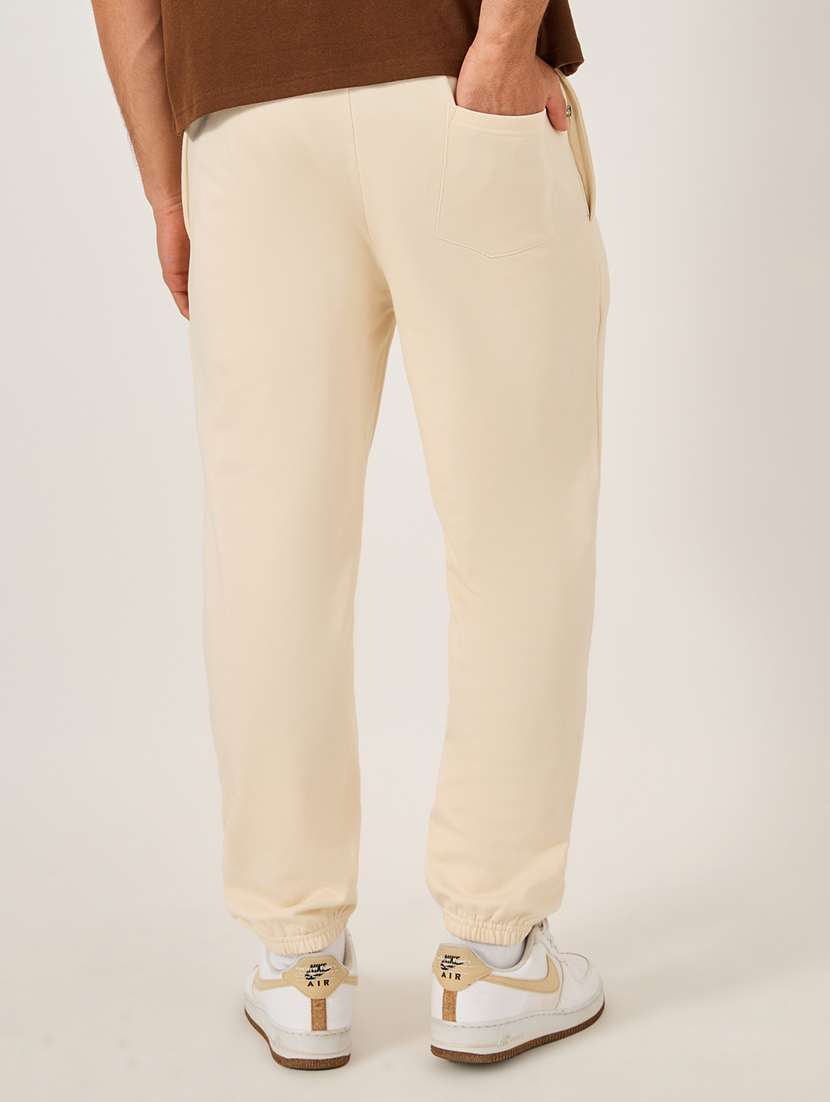 men solid mid rise relaxed fit jogger - 21971742 -  Standard Image - 2