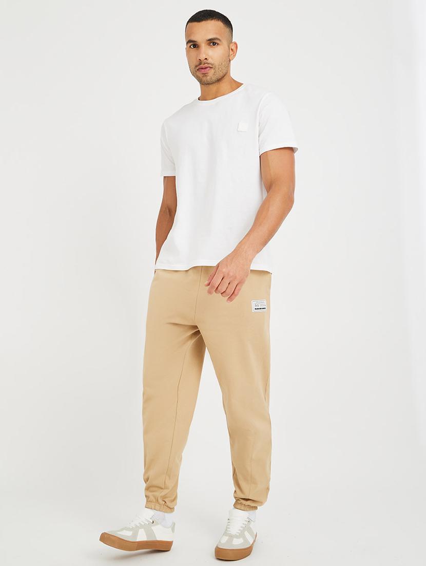 men solid mid rise relaxed fit jogger - 21971748 - Standard Image - 2