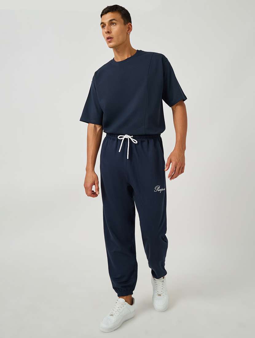 men printed mid rise relaxed fit jogger - 21971754 -  Standard Image - 2