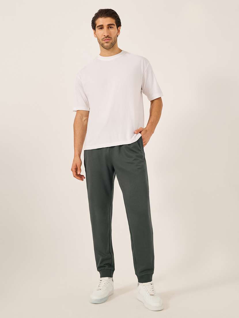 men solid mid rise regular fit jogger - 21971763 -  Standard Image - 2