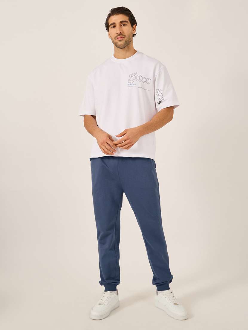 men solid mid rise regular fit jogger - 21971765 -  Standard Image - 2