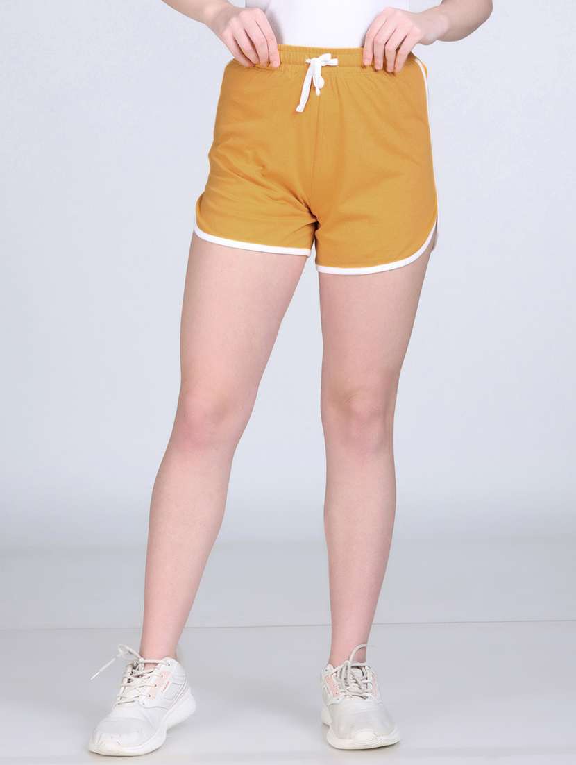 women mustard solid mid rise sports shorts