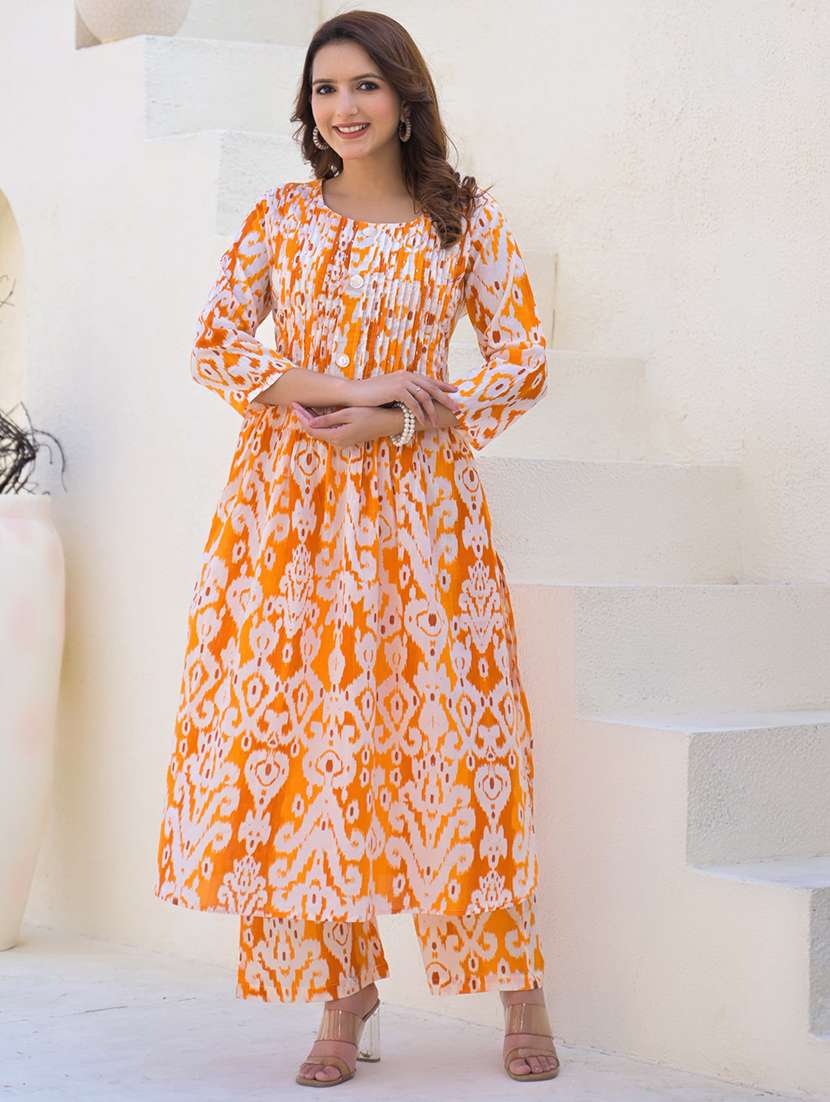 women ikat printed three quarter sleeve kurta pant set