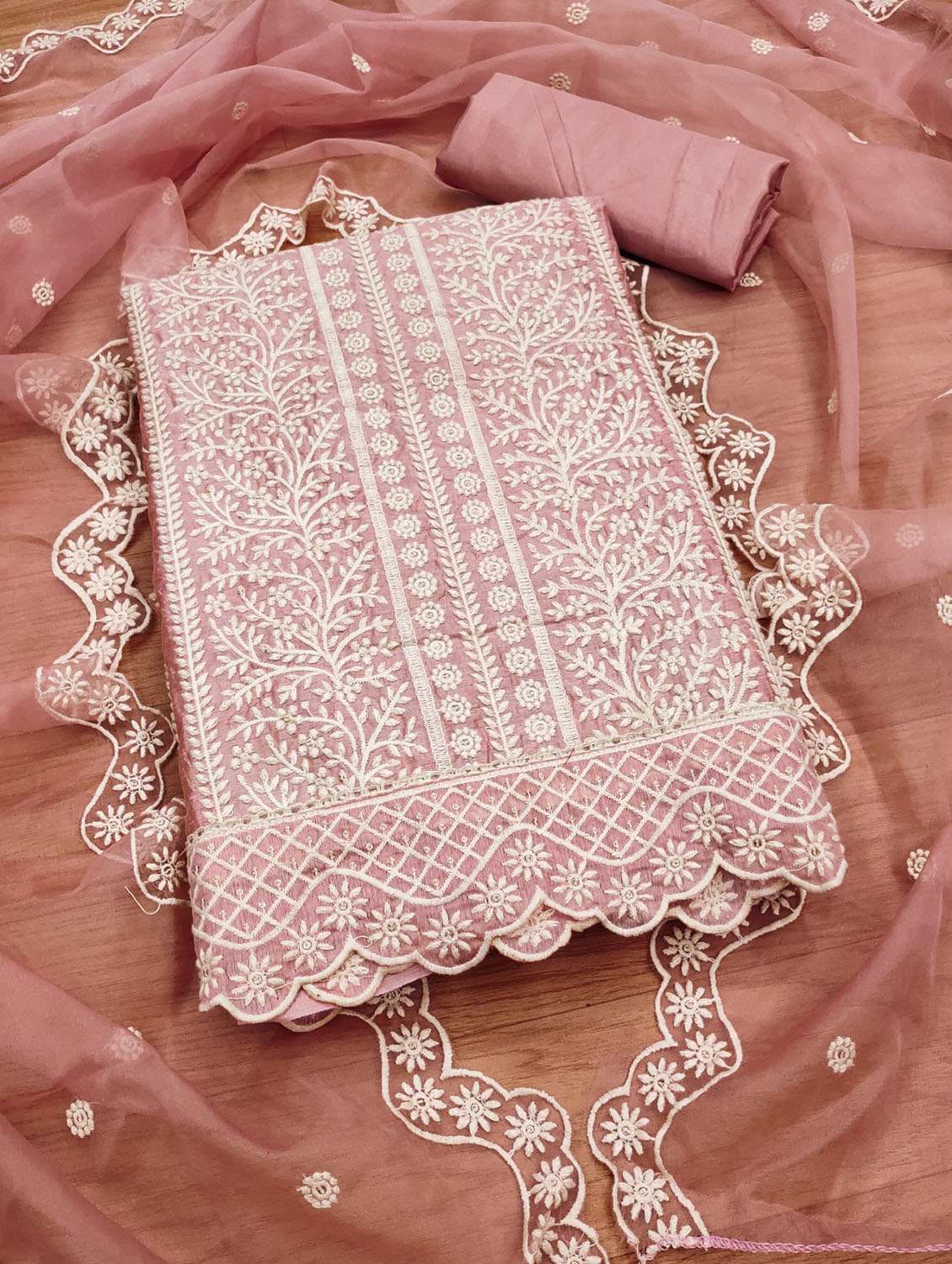 women solid with work embroidered unstitched suit set