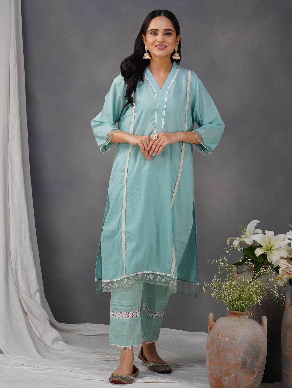 women solid with work three quarter sleeve a-line kurta