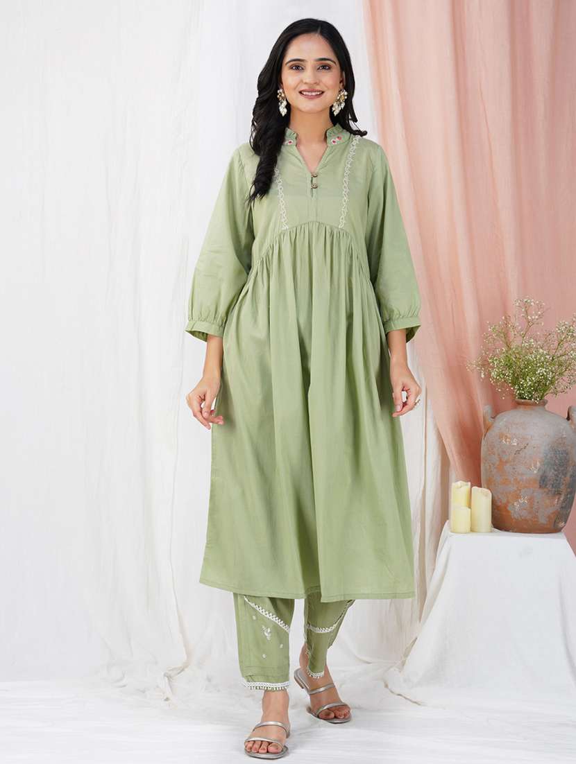 women solid with work three quarter sleeve a-line kurta