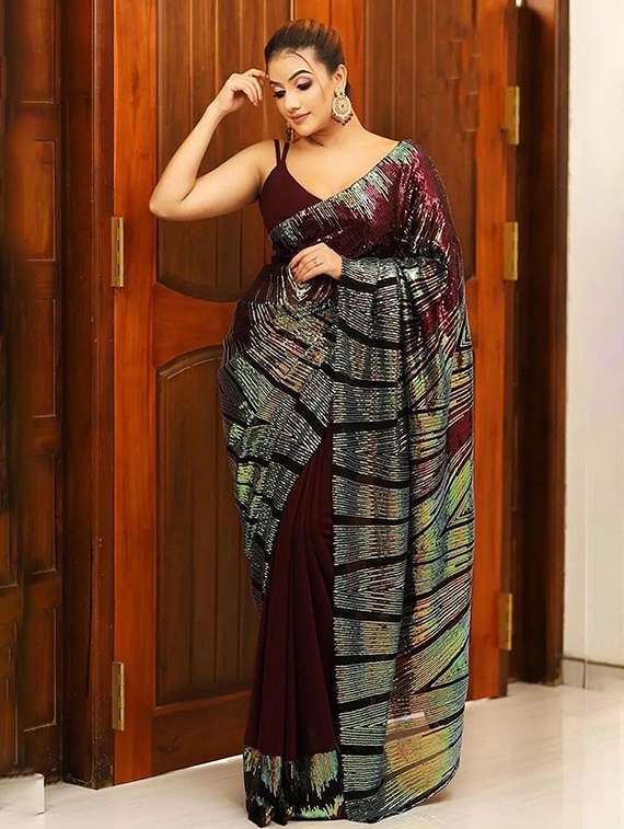 women maroon embellished saree with blouse
