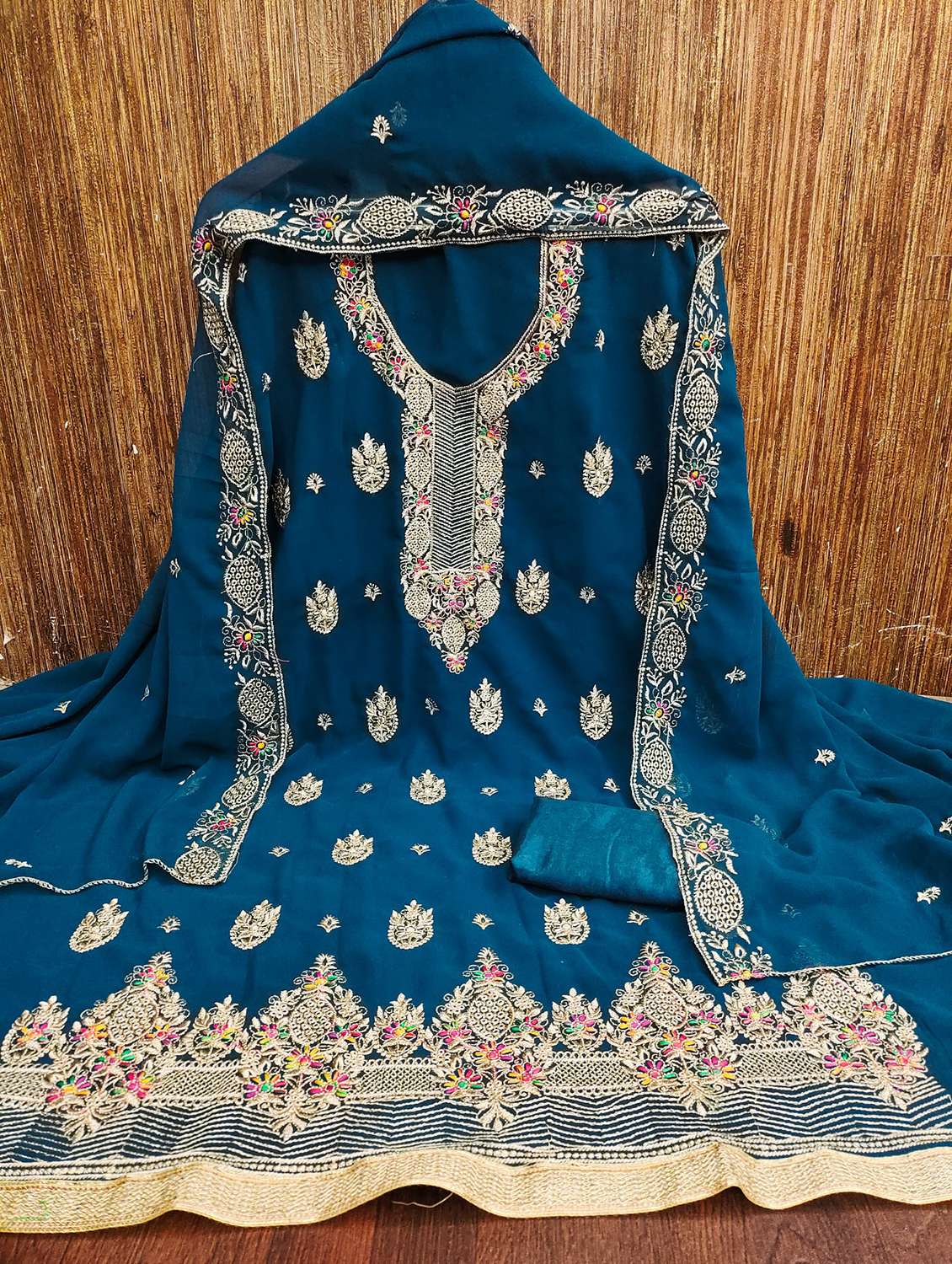 women solid with work embroidered unstitched suit set