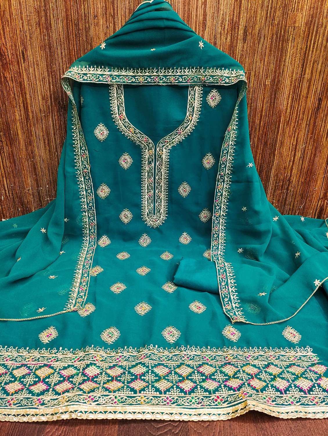 women solid with work embroidered unstitched suit set