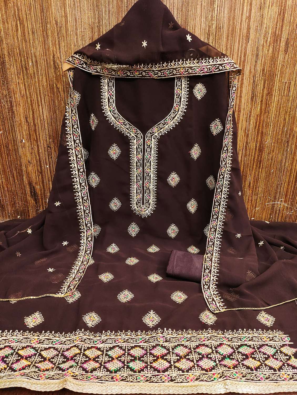 women solid with work embroidered unstitched suit set