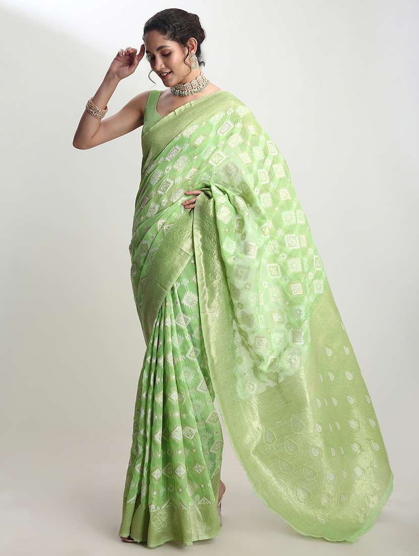 women self design banarasi saree with blouse