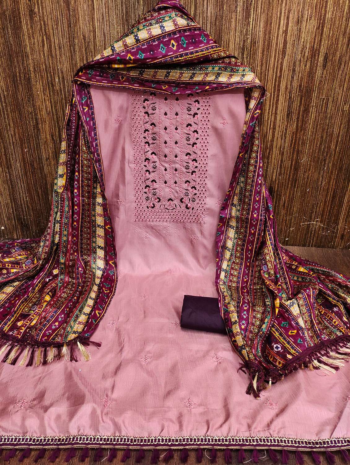 women solid with work embroidered unstitched suit set