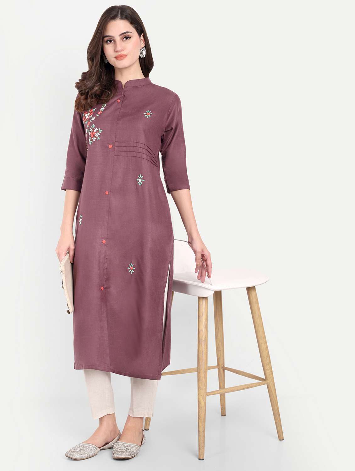 women embroidered three quarter sleeve kurta