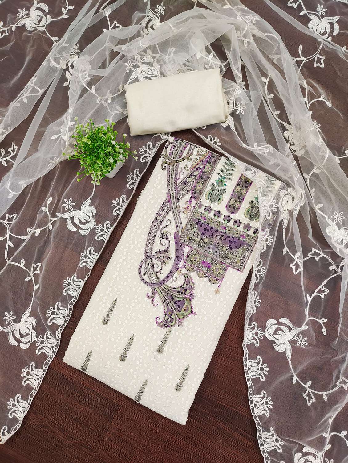 women embroidered unstitched suit set