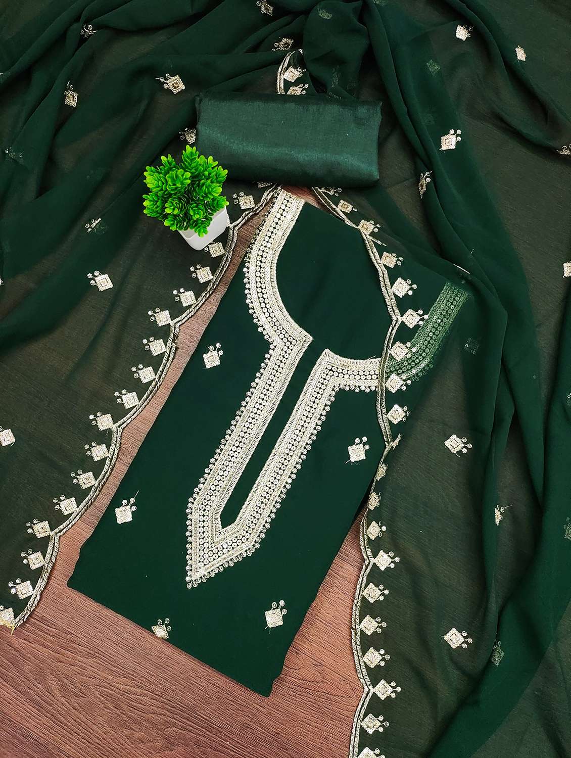 women embroidered unstitched suit set