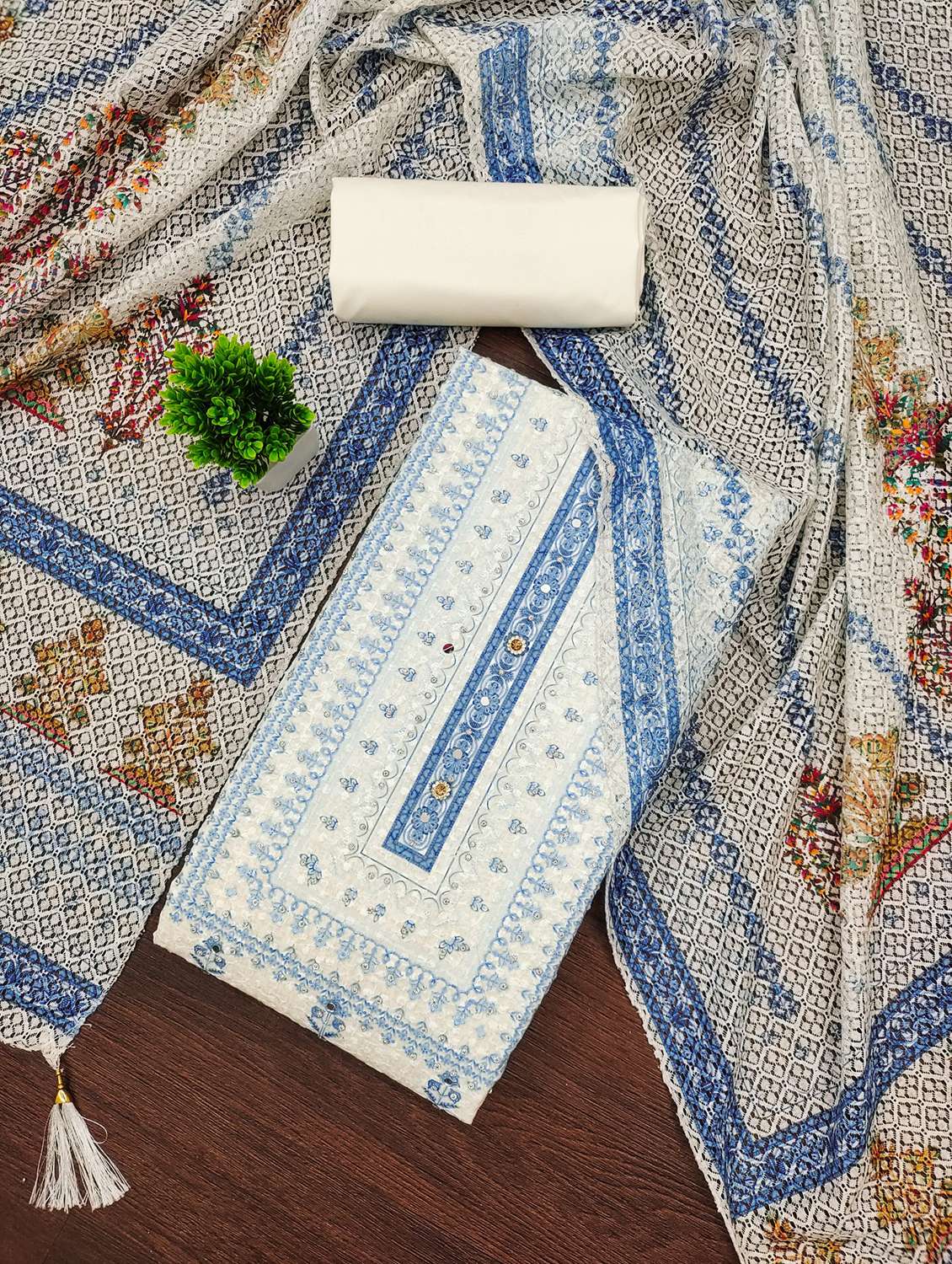 women embroidered unstitched suit set