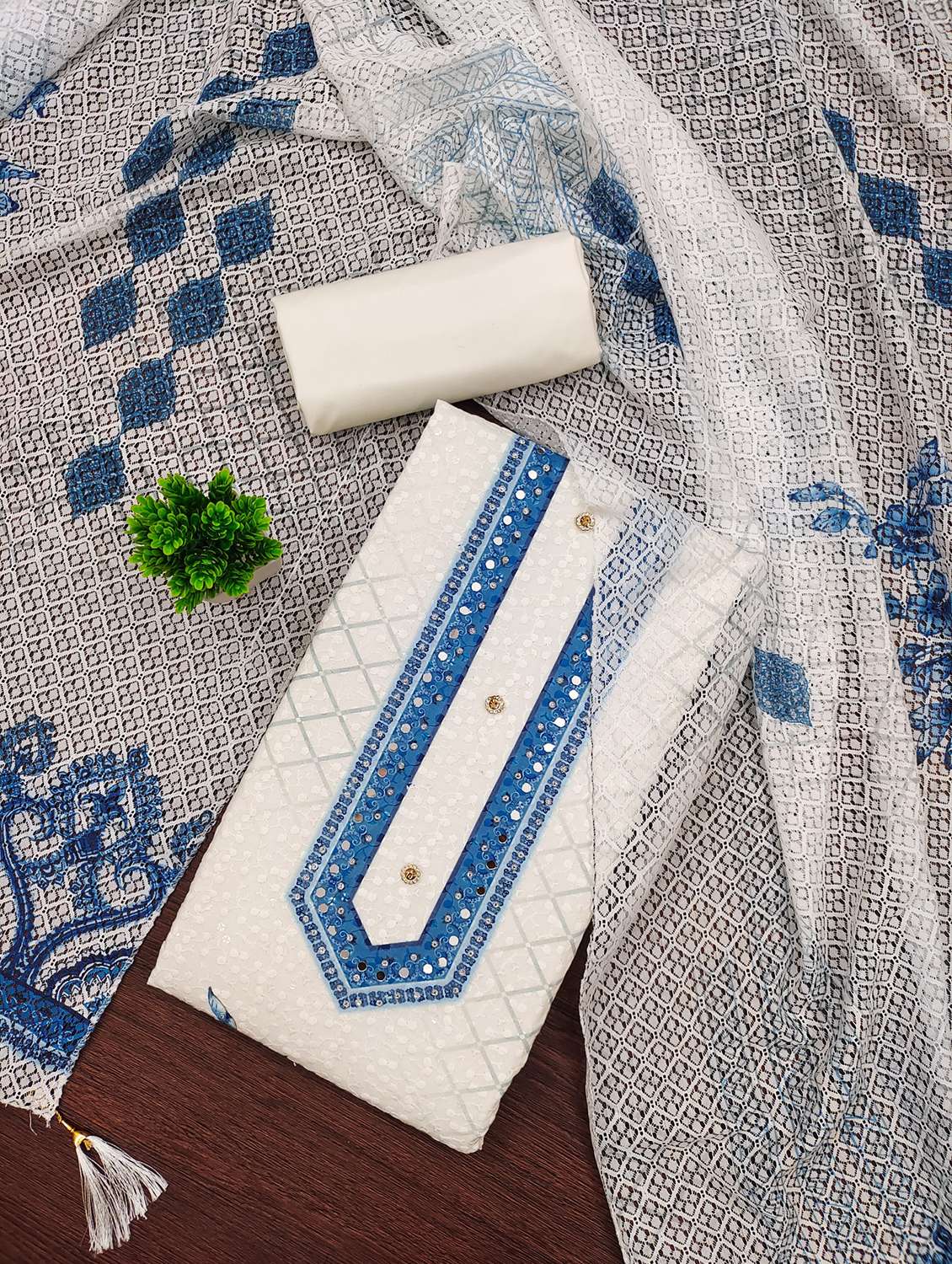 women printed with embroidery work unstitched suit set