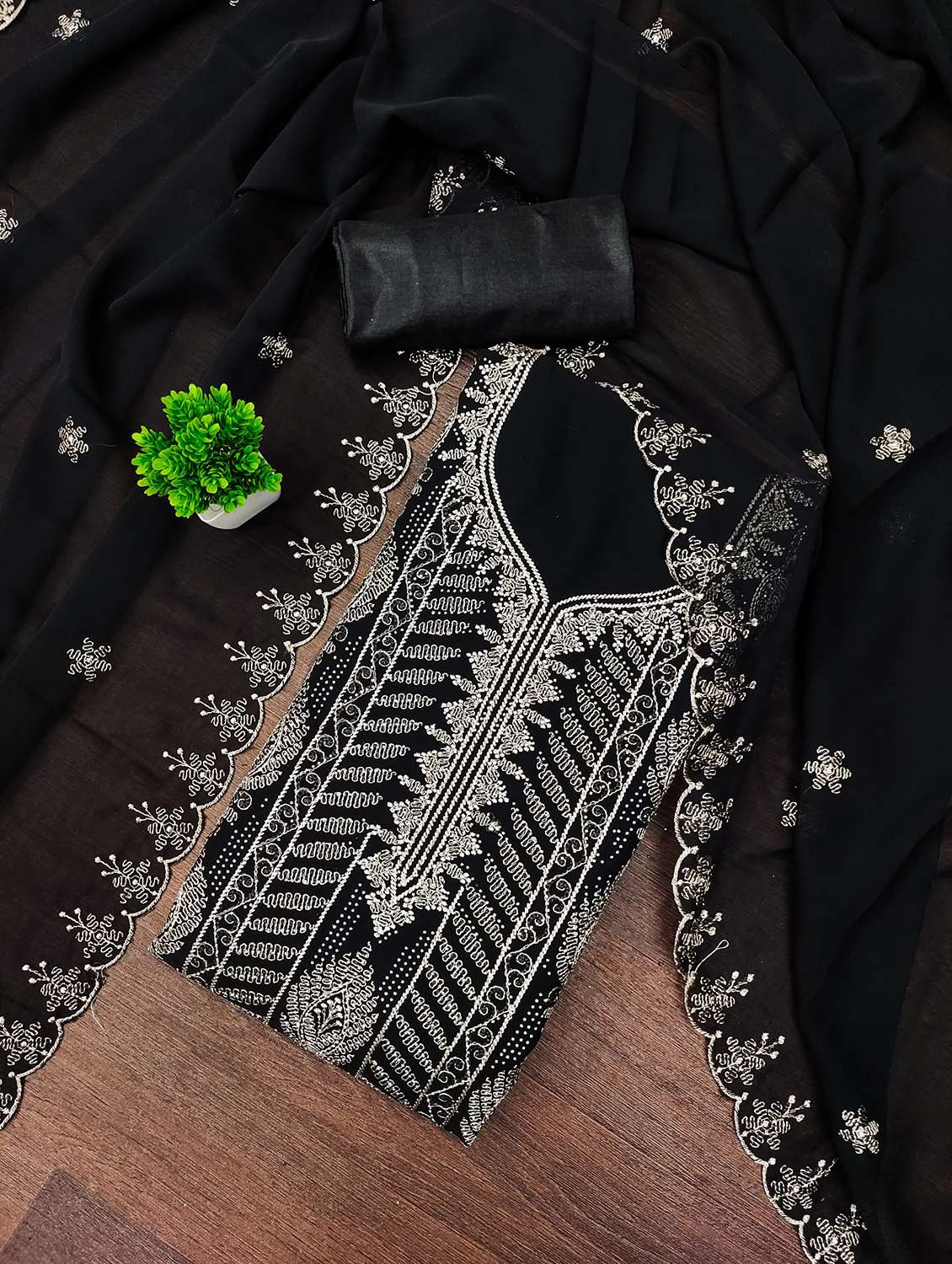 women embroidered unstitched suit set