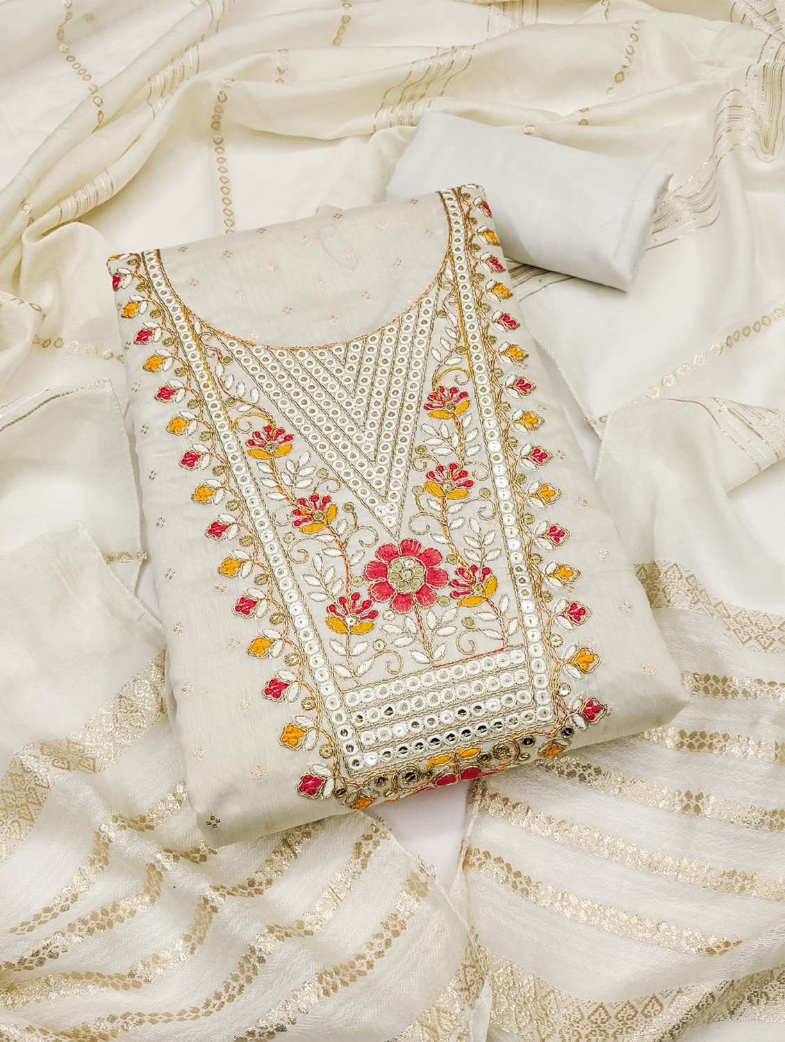 women self design embroidered unstitched suit set