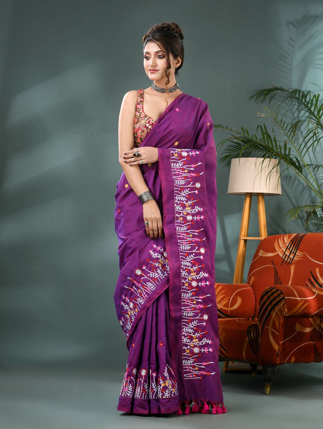 women purple embroidered saree with blouse
