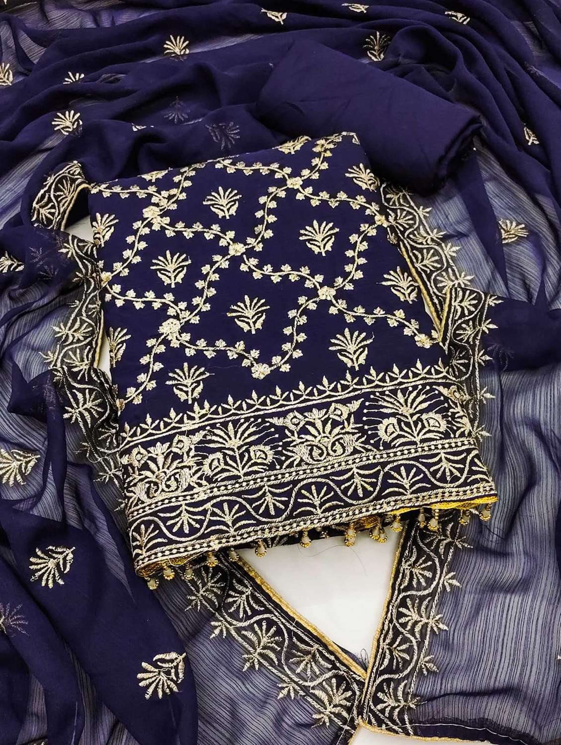 women solid with work embroidered unstitched suit set