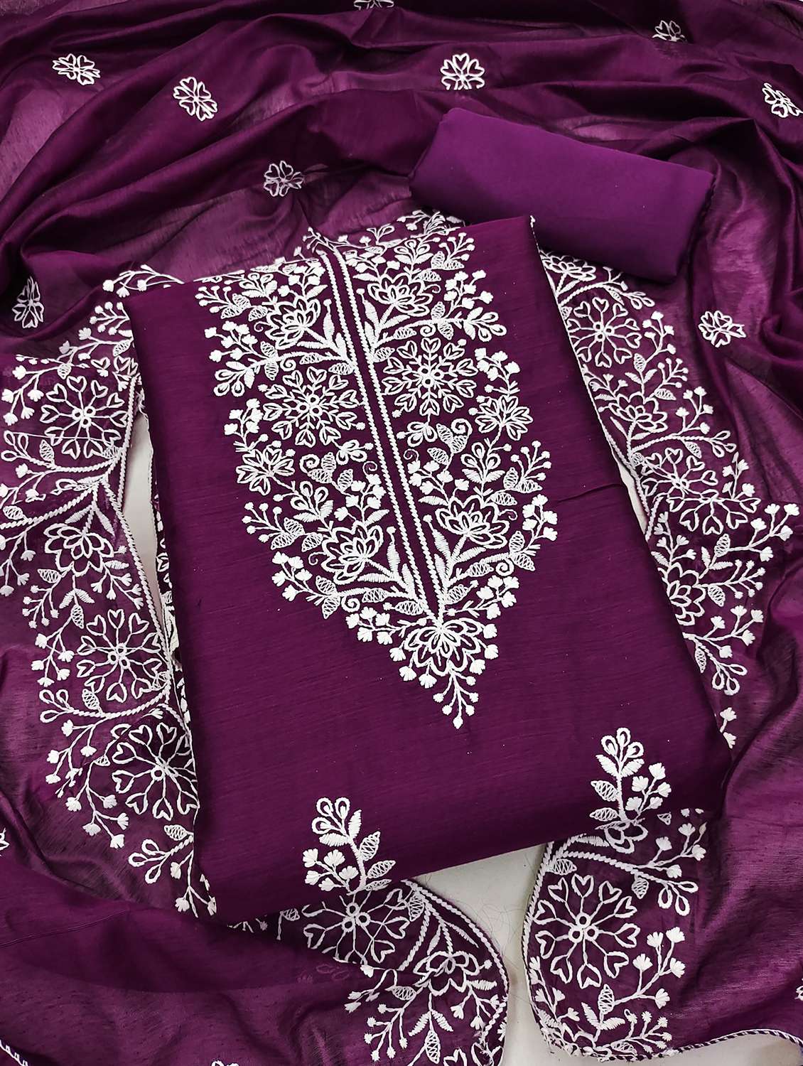 women embroidered unstitched suit set