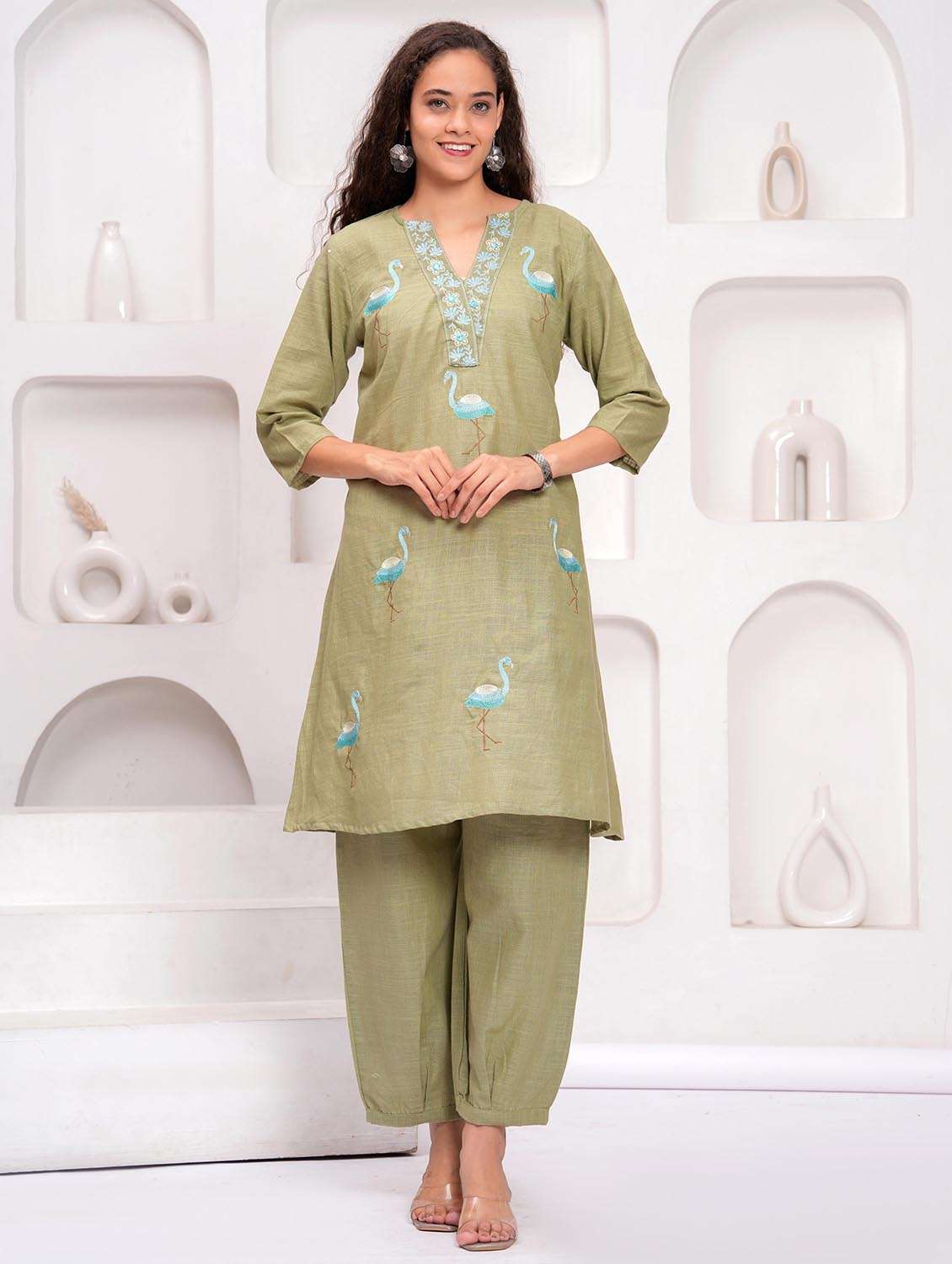 women embroidered kurta and salwar set