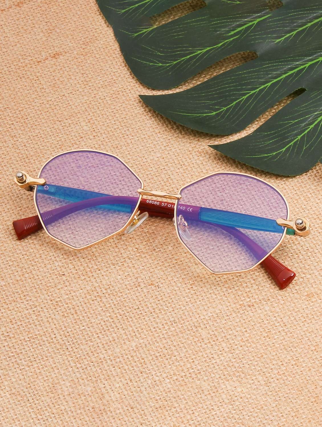 ted smith unisex aesthetic-bold gold oval sunglasses with uv protected lens