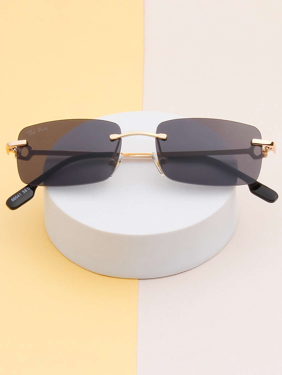 ted smith unisex aesthetic-bold gold-black rimless sunglasses with uv protected lens