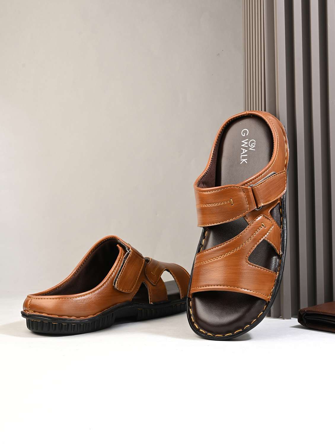 men tan slip on sandal
