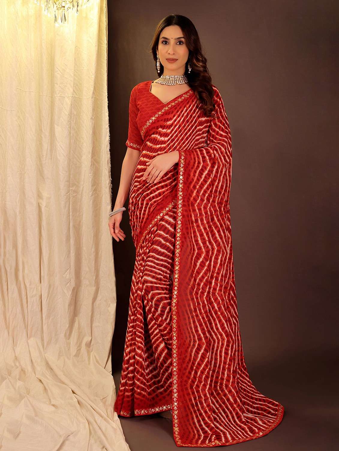women leheriya printed saree with blouse