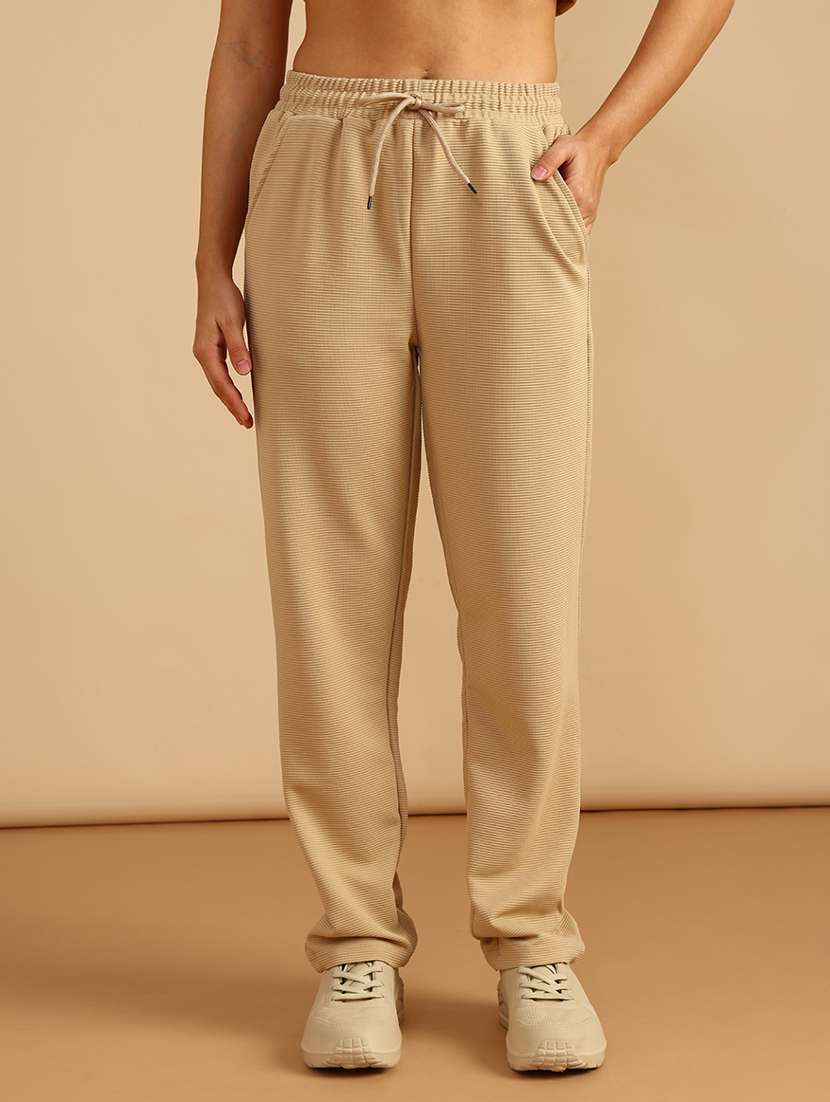 women solid mid rise relaxed fit track pant - 22008946 -  Standard Image - 2