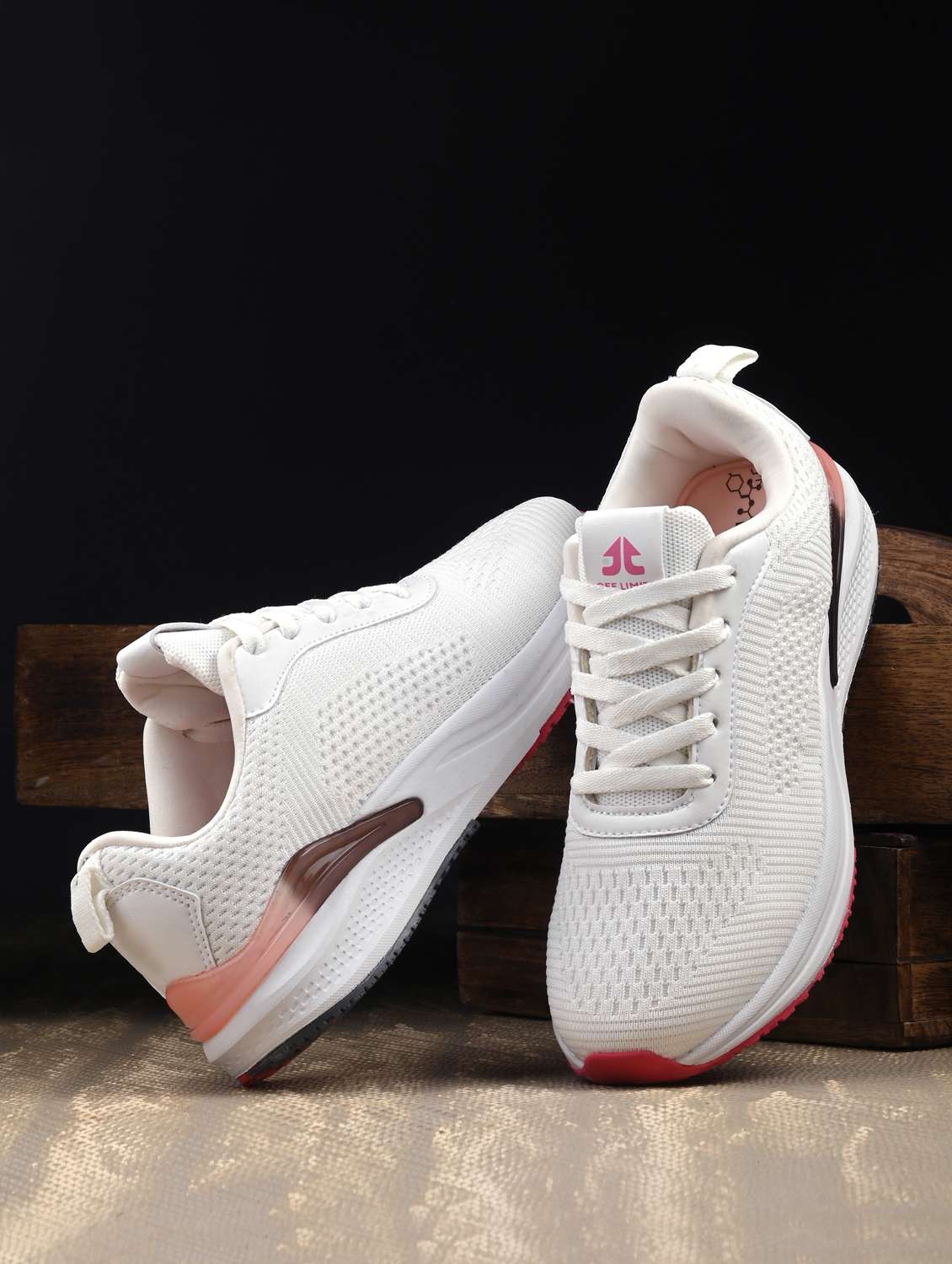 women white lace-up sports shoe