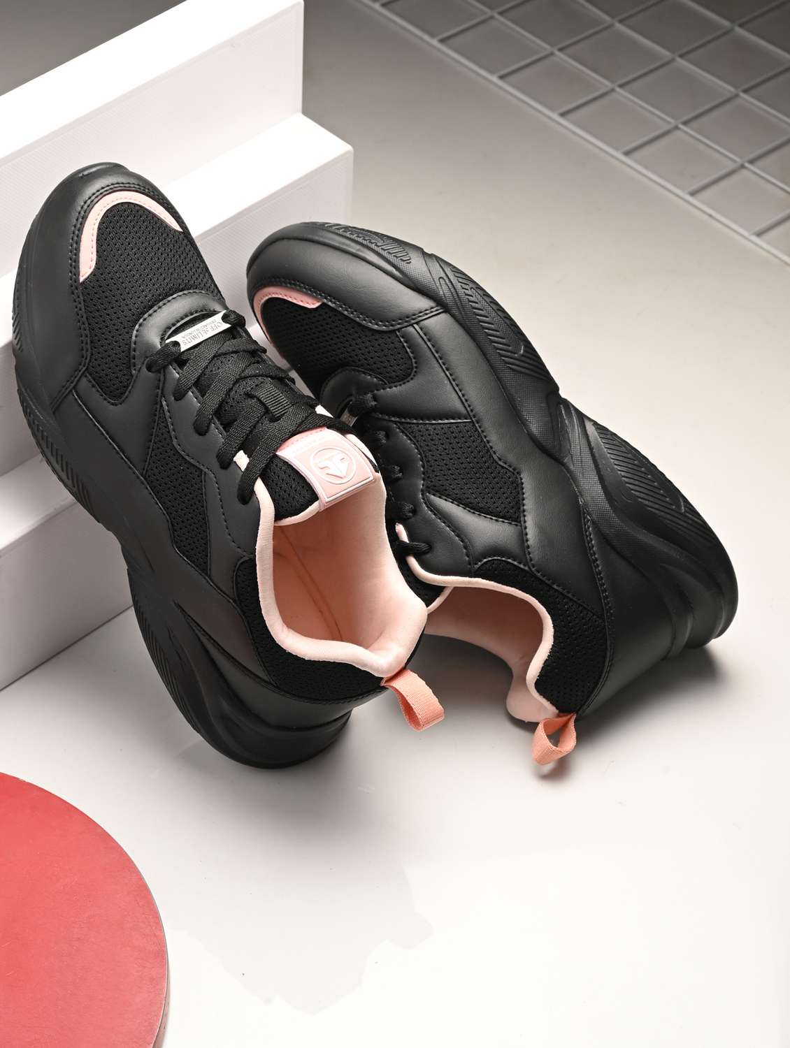 women black lace-up sports shoe