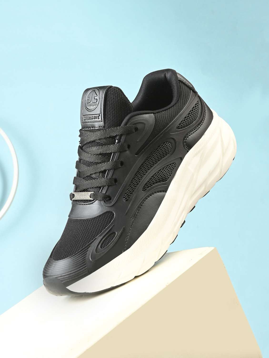 women black lace-up sports shoe