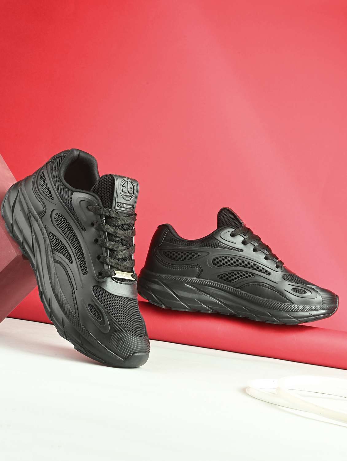 women black lace-up sports shoe
