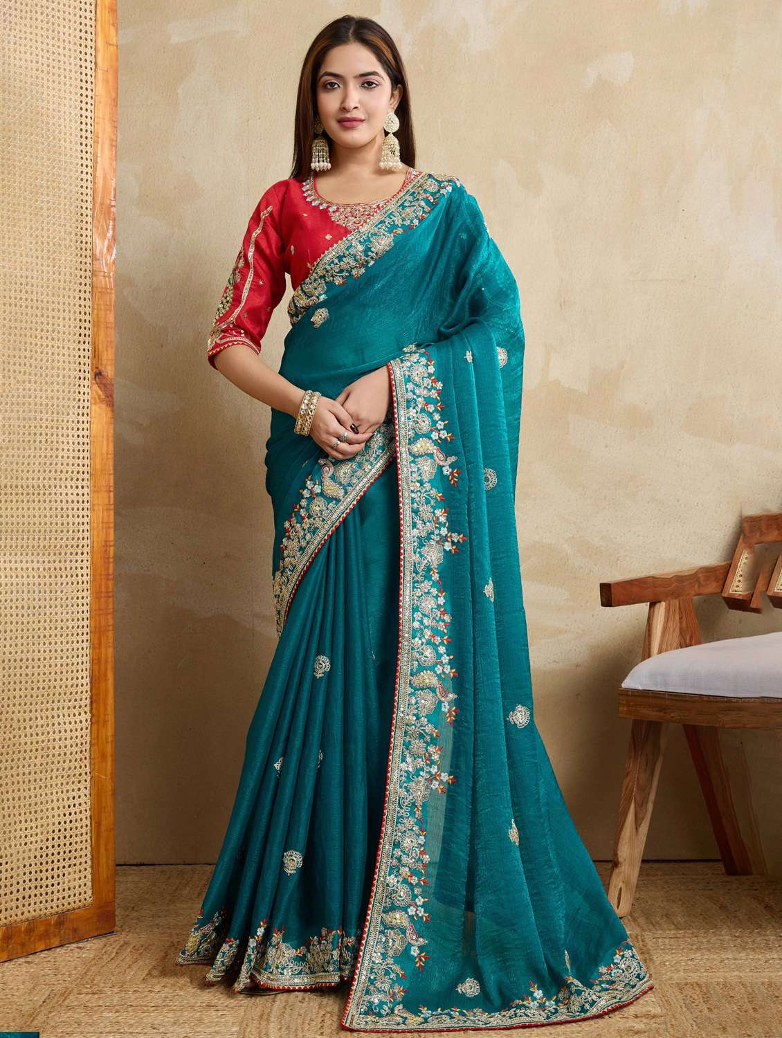 women solid with work embroidered saree with blouse