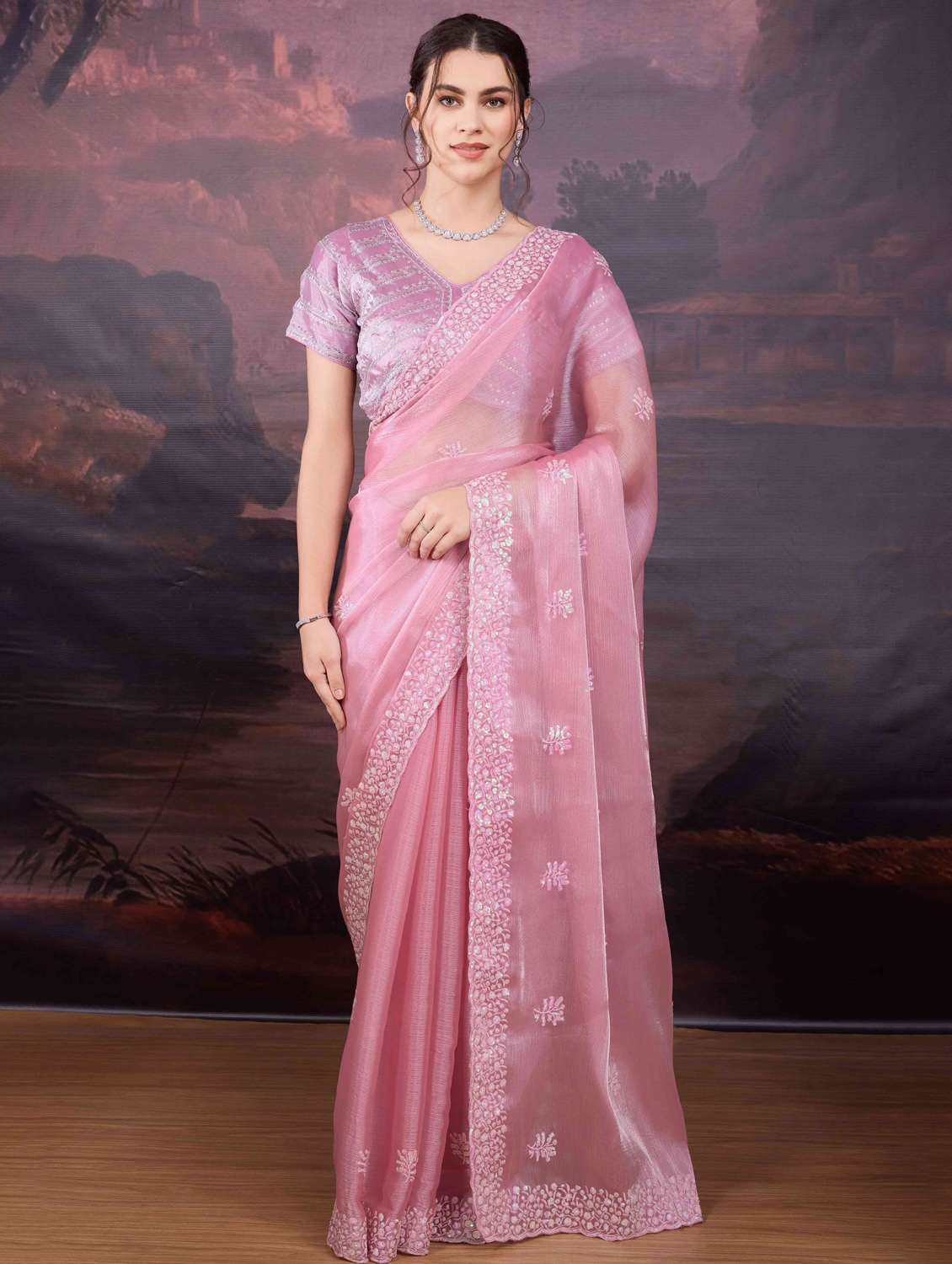 women solid with work embroidered saree with blouse