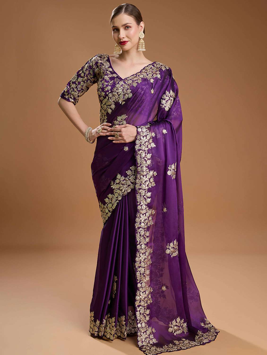 women solid with work embroidered saree with blouse