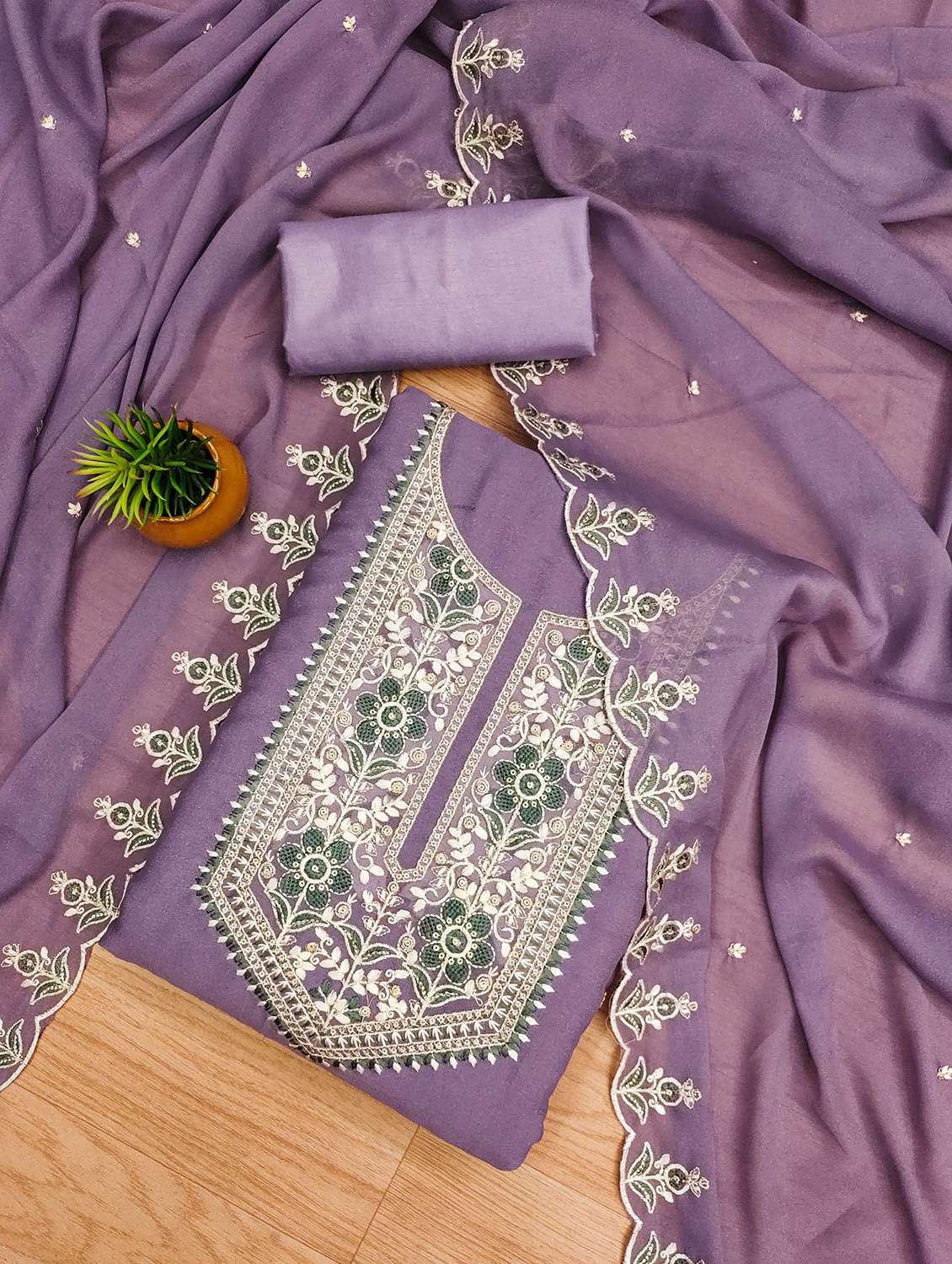 women solid with work embroidered unstitched suit set