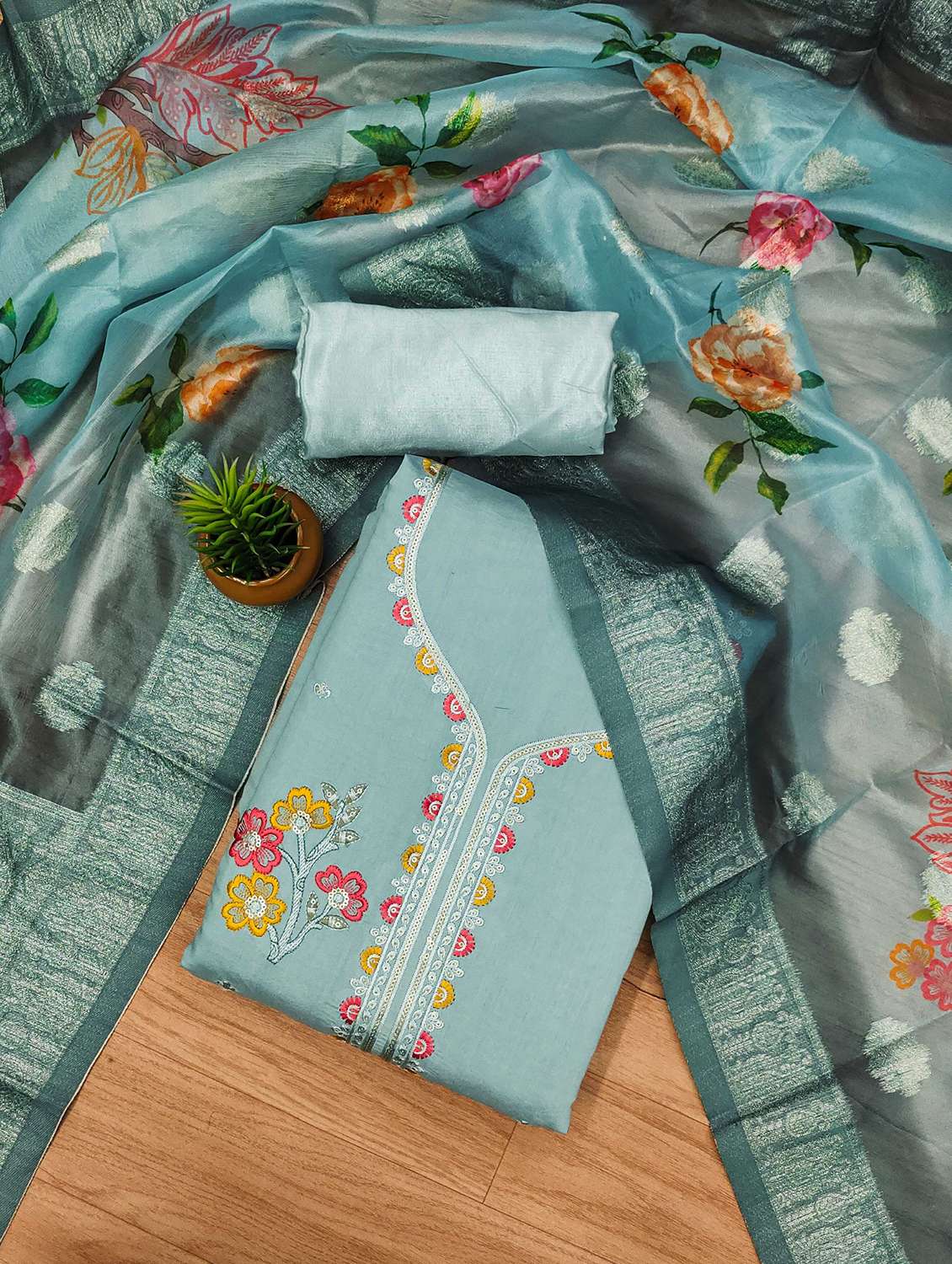 women solid with work embroidered unstitched suit set