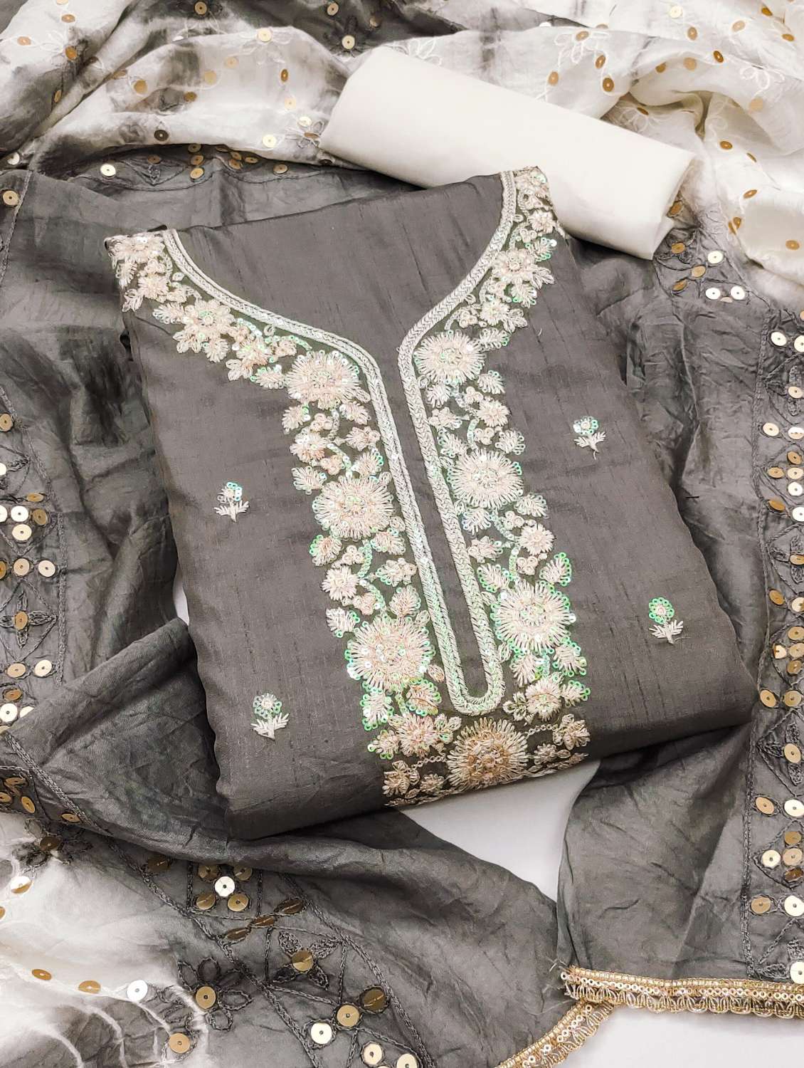 women solid with work embroidered unstitched suit set