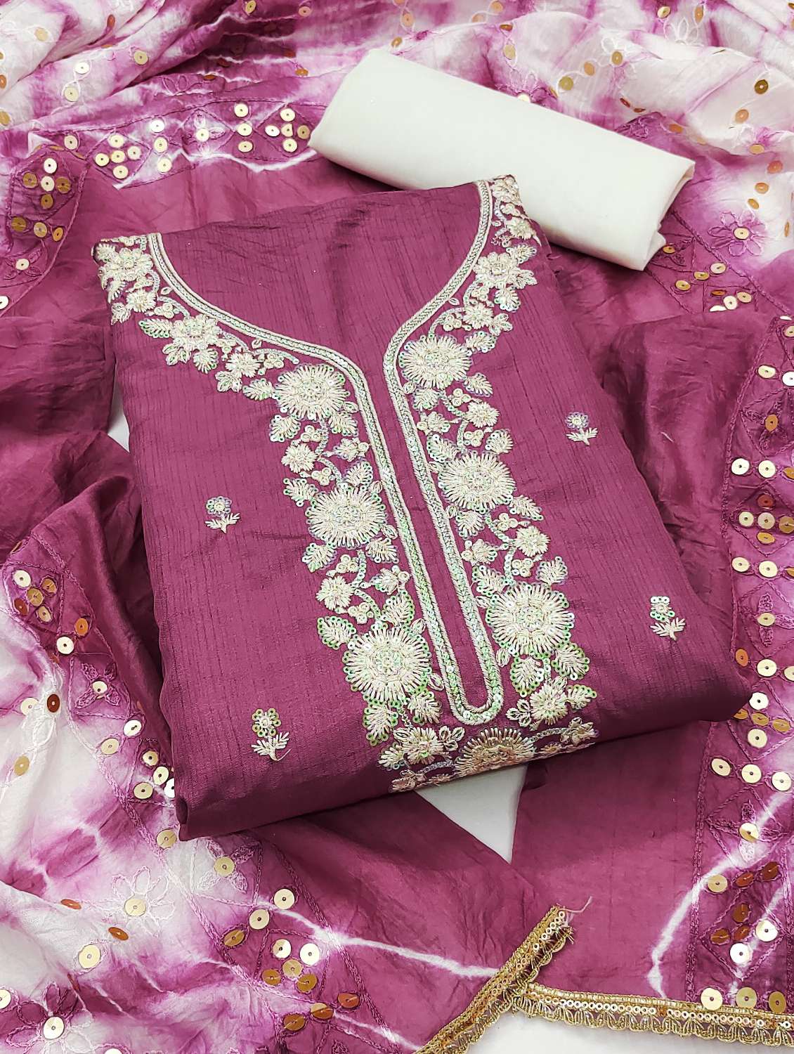 women solid with work embroidered unstitched suit set