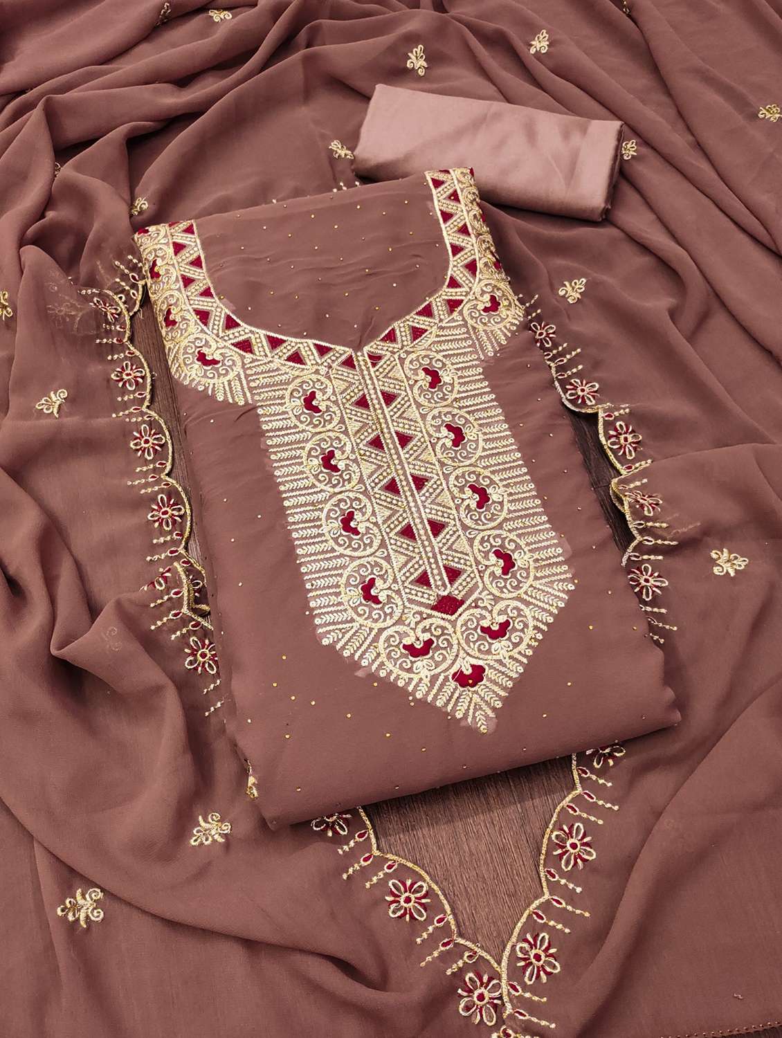 women solid with work embroidered unstitched suit set