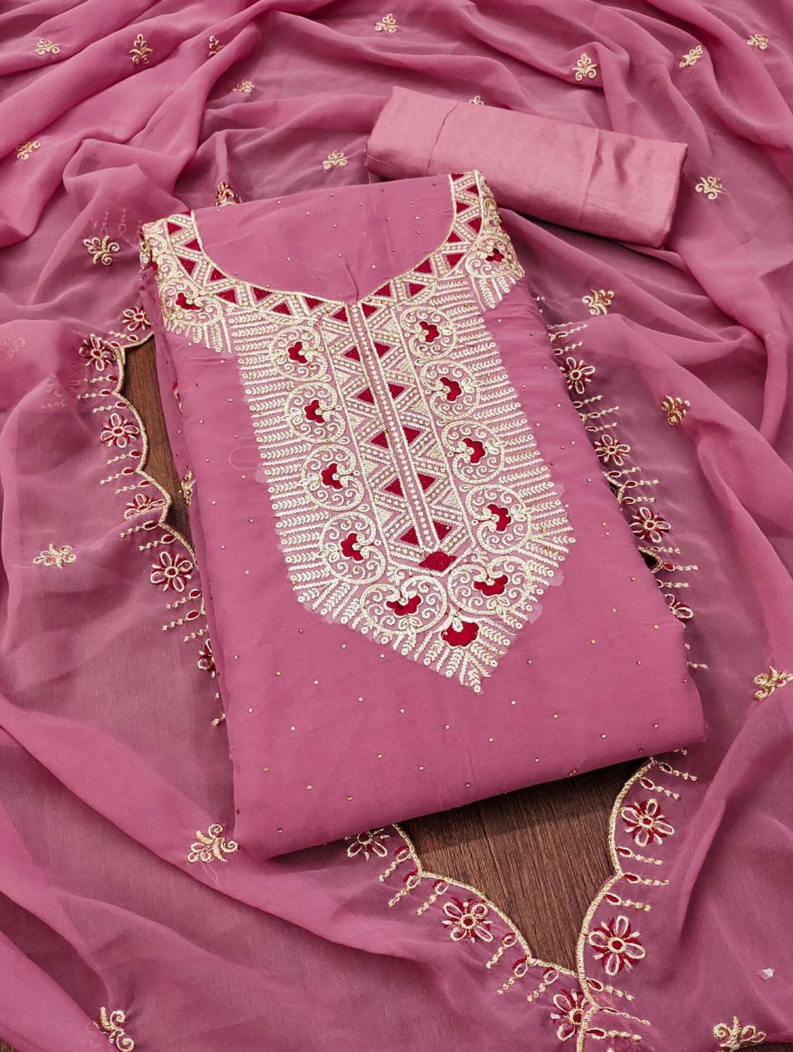 women solid with work embroidered unstitched suit set